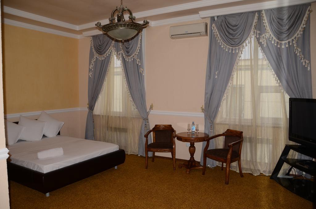 Saryarka Hotel Astana Quarto foto