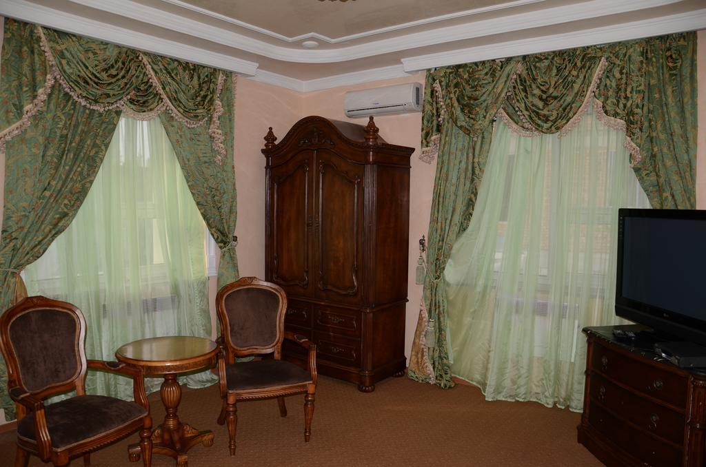 Saryarka Hotel Astana Quarto foto